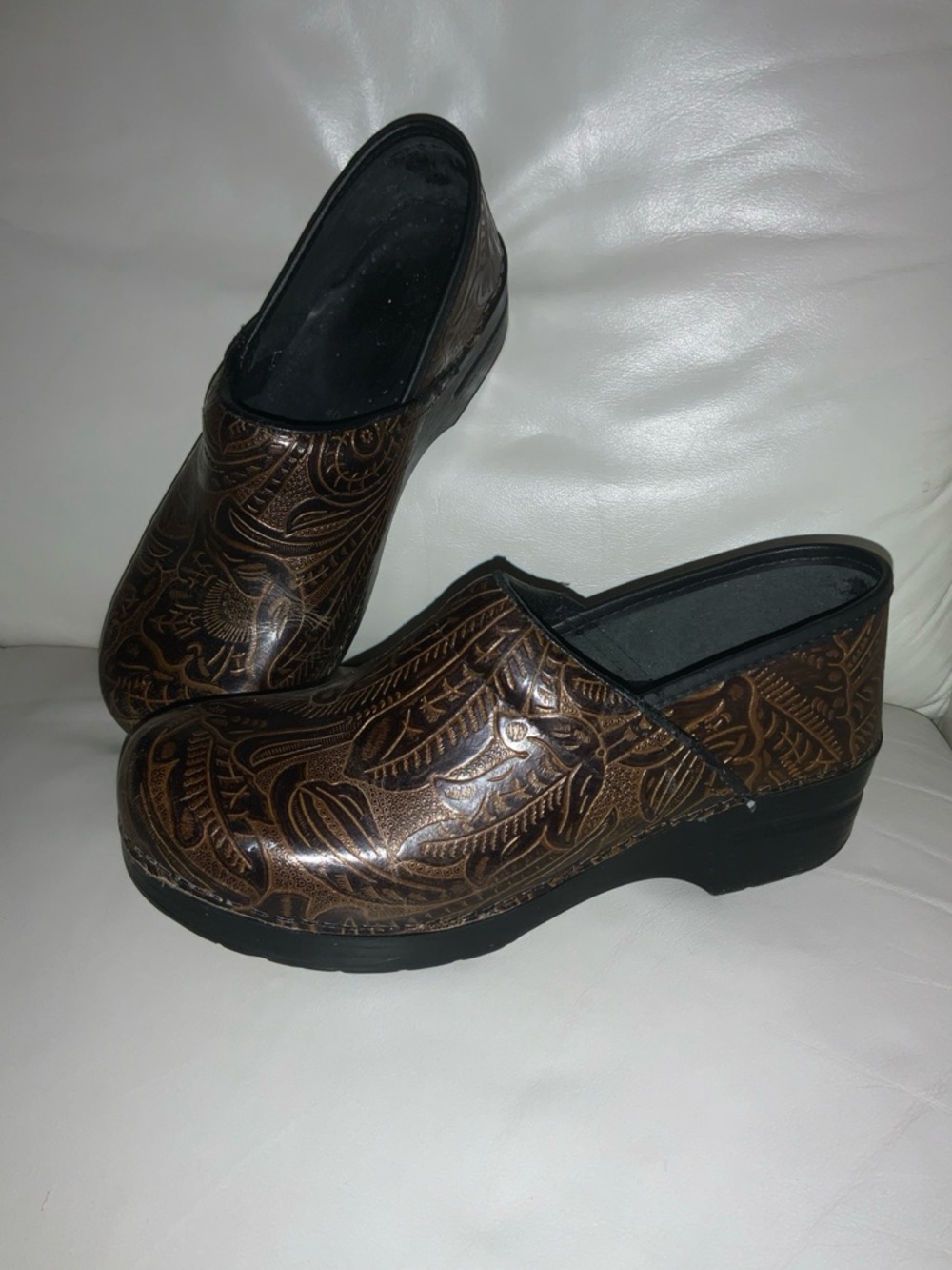 Dansko professional clogs. Rare engraved design. Missing heel pad. Barely worn.